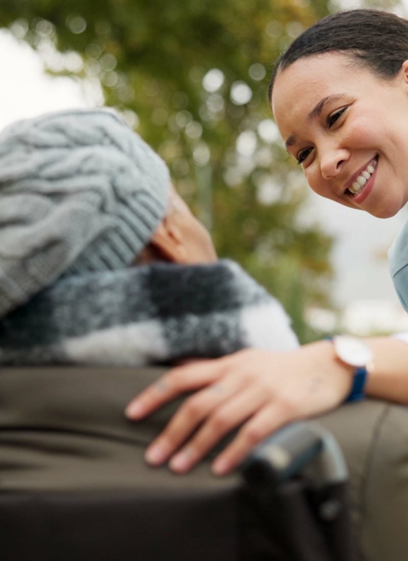 Nurse, support and park with old woman in a wheelchair for retirement, elderly care and physical th